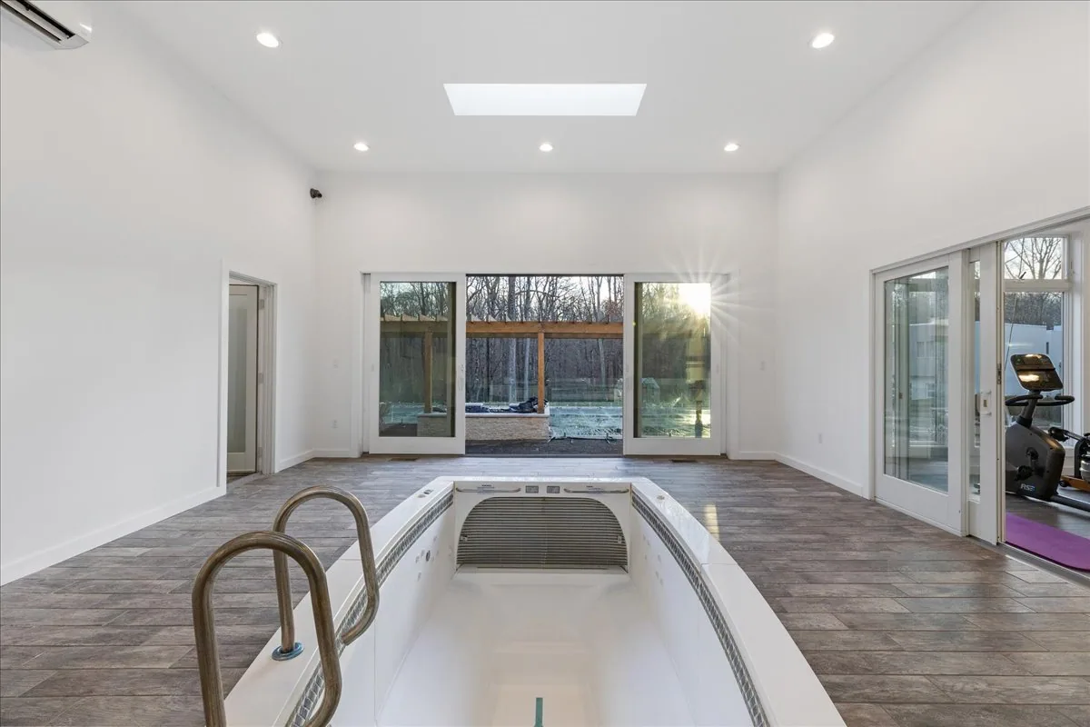 Gym house with indoor endless pool